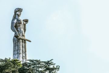 Mother of Georgia  - Kartlis Deda - a monument in Georgias capital Tbilisi - Metal statue on Sololaki ridge of woman greeting enemies with sword and friends with bowl of wine