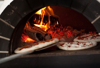 mouth-watering Italian pizza baked in a wood-burning oven