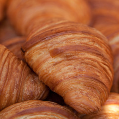 delicious tasty croissants in a shop window