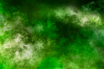Obraz na płótnie Canvas spectacular abstract white green smoke isolated black background