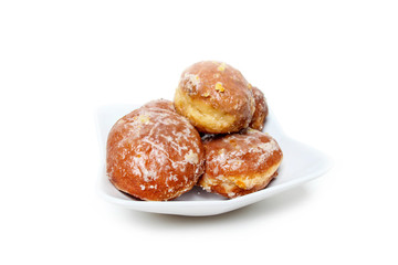 Stack of homemade donuts with icing