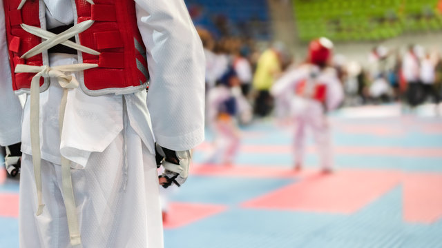 Moment of Taekwondo Kids in the stadiums. Athlete to strike an opponent during the tournament taekwondo kids.