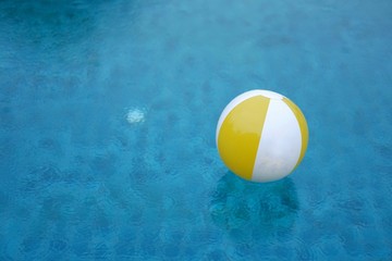 beach ball in swimming pool