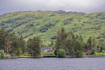 Fototapeta na wymiar House on the Loch Katrine, Loch Lomond & The Trossachs National Park, Scotland, UK