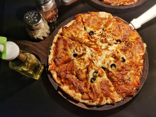 Smooth baked thin crust pizza.