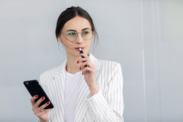 Business Woman Using Phone Near Office