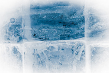 Obraz na płótnie Canvas Textured ice block surface background.