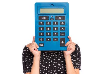 Smart student holding big calculator - covering face. Portrait of funny teen girl, isolated on white background. Child Back to school, Educational or Business Concept.