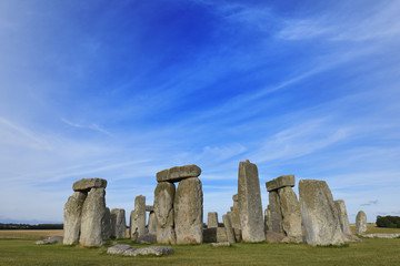 Naklejka premium Stonehenge an ancient prehistoric stone monument from Bronze and Neolithic ages, constructed as a ring near Salisbury with dramatic sky, Wiltshire in England, United Kingdom