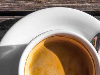 white Coffee cup on wooden table background