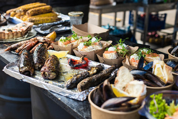 ish, mussels, salmon, corn at a street festival