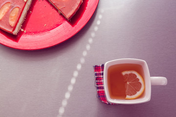 red cheesecake and  tea