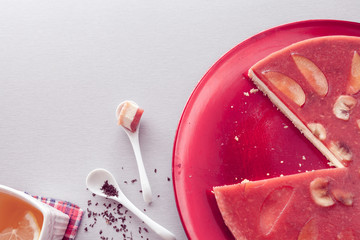 red cheesecake with tea
