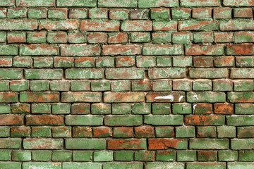 Old green brick wall, rustic texture, design background.