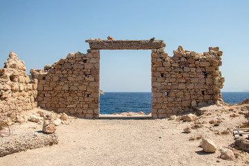 Stone gate overlook to sea, Milos island