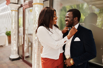 Stylish african american couple in formal wear. Romantic couple in love dating.