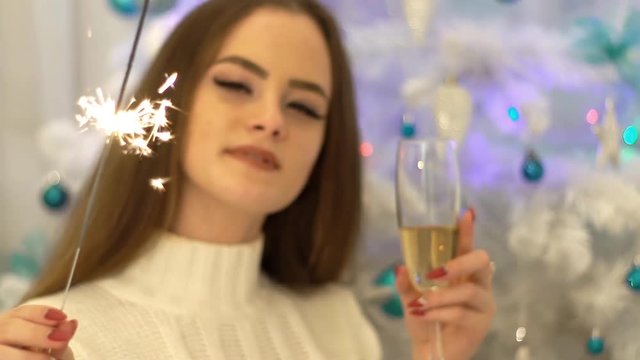 Celebration, Drinks And Holiday Concept - Close Up Of Young Woman With Sparkler.