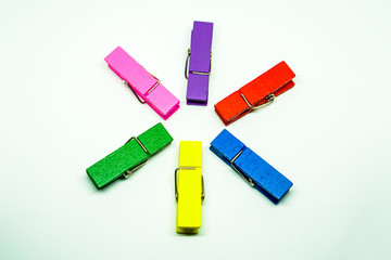 Many colorful Clothespin on a white background