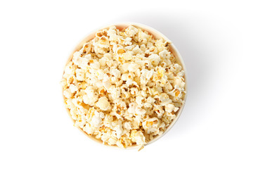 Striped bucket with popcorn isolated on white background, top view