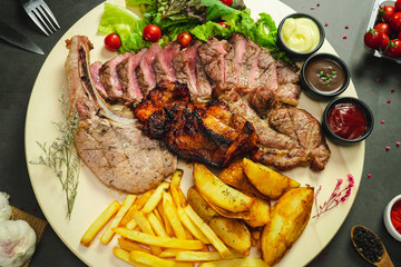 Food shot mix grilled steak with fried and salad