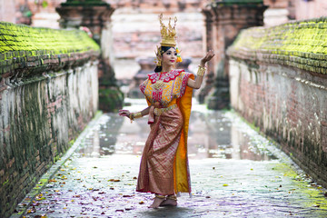 Thailand traditional or cultural dance. Thai beautiful girl is dancing called Ram, it is noble Thai art of elegance.