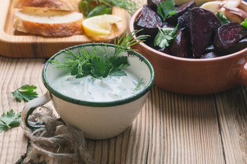 Yogurt dip with parsley, roasted beets, vegan plant based meal