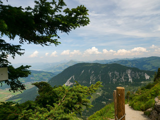 Beautiful alpine landscape with green meadows, alpine cottages and mountain peaks, Alpinolino, Westendorf Tyrol Alps, Austria