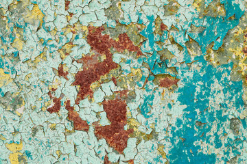 Colored cracked torn multilayer paint rusty blue surface texture background