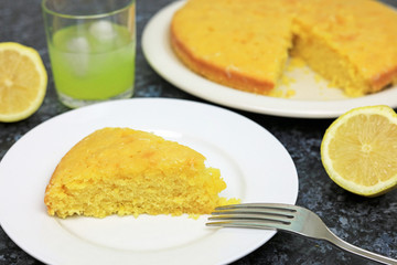 Home made Slice Of Lemon Drizzle Cake Made With Fresh Lemons And Limoncello