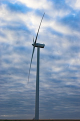 wind turbine against blue sky