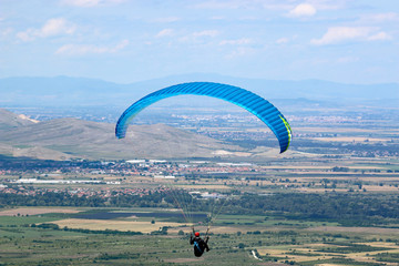 Paraglider flying from Brestovitsa in Bulgaria