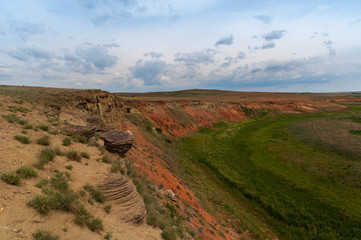 Fototapeta na wymiar Tourist places of Russia. Beautiful landscapes of the world. Limestone pits against the bright sky and clouds