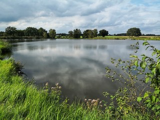 Lake with cloud reflections