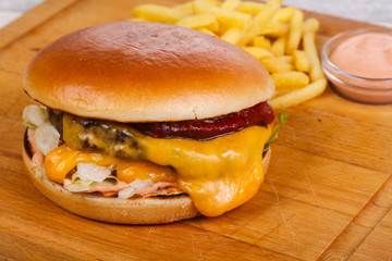 Burger with beef, cheese and iceberg salad