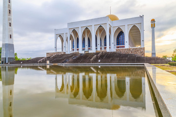 Central mosque /Beautiful sunset and reflection at  the central mosque in songkhla Thailand/Landscape of beautiful twilight sunset sky reflections front water at central mosque of songkhla Thailand/
