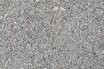 Gravel texture. Fine gray stone gravel.