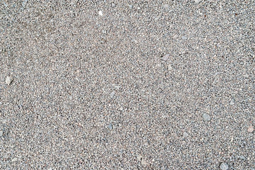 Gravel texture. Fine light gray stone gravel.