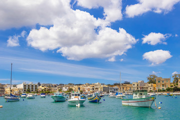 Fototapeta na wymiar View of a seaside promenade in Birzebbuga, Malta