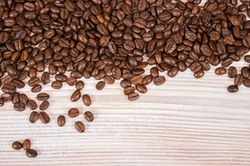 mockup of coffee beans on isolated wooden textured background