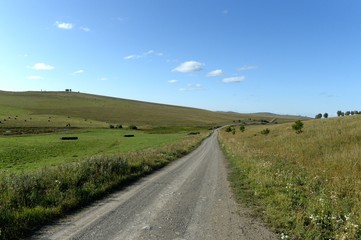 Russia.Western Siberia. The road in the foothills of the Altai mountains
