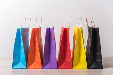 row of colourful shopping bag