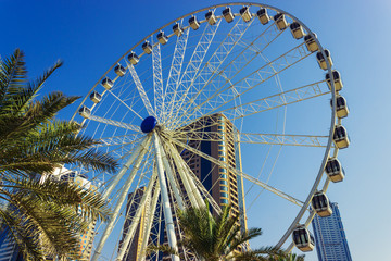 giant ferris wheel sharjah eye at sunny day, United Arab Emirates