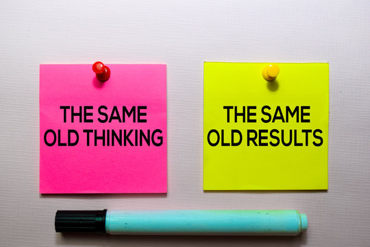 The Same Old Thinking and The Same Old Results text on sticky notes isolated on office desk