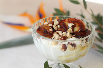 On a light background dessert surrounded by orange flowers