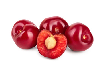 cherry with half closeup isolated on white background,