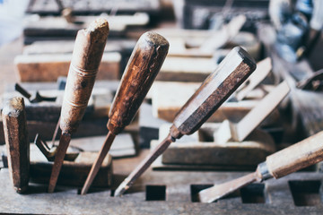 Old carpentry tools in a wooden workshop