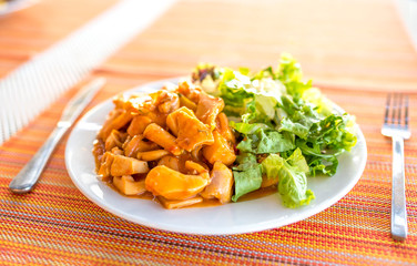 Mediterranean healthy meal, plate full of sea food and green salad