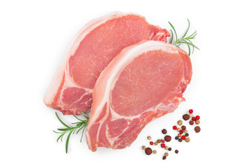 sliced raw pork meat with rosemary isolated on white background. Top view. Flat lay