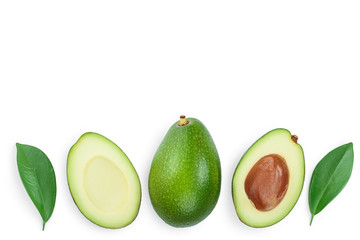 avocado and slices decorated with green leaves isolated on white background with copy space for your text. Top view. Flat lay