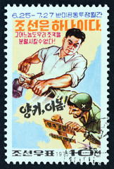 Korean preventing American soldier ramming a border pile (North Korea 1975)